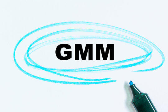 writing the text: GMM. Check list and marker. Definition of the word highlighted with a marker.