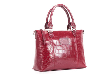 Naklejka premium red stylish ladies leather bag on a white background