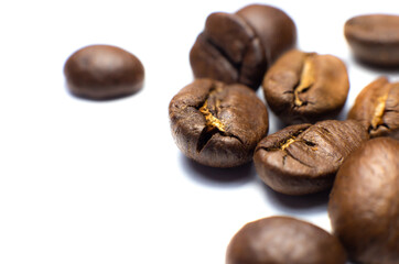 Coffee beans on white background. Close up photo.