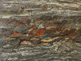 Iron ore. Abstract natural stone texture. Background for packaging and design. Stone wall pattern.