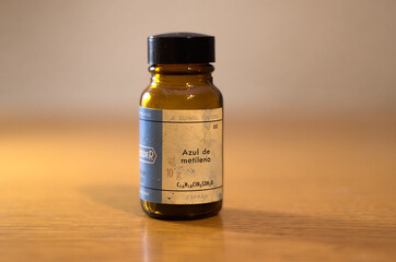 Old chemical bottle with methylene blue. Its used as a tincture to stain certain parts of the body before or during surgery. Its use is mainly as a topical antiseptic and internal healing.