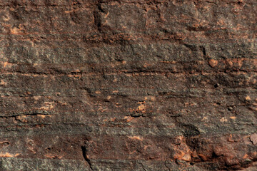 Ancient geological abstract natural stone texture. Background for packaging and design. Stone wall pattern.