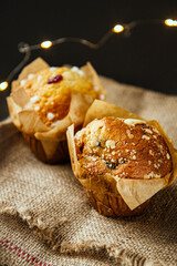 Homemade muffins with blueberries on a black background
