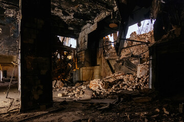 Burnt interior of industrial building or warehouse. Consequences of fire
