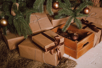 Naklejka na ściany i meble beautiful Christmas gifts under tree in new year decorated house interior
