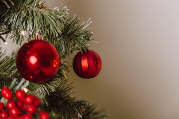 Christmas Tree with Red Balls and Stars. Winter Holiday Background.