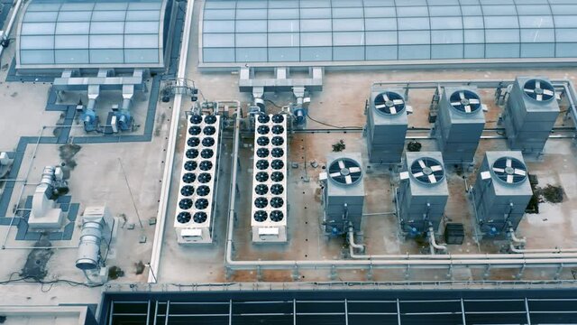 Air conditioning and ventilation systems installed on the rooftop. Aerial view