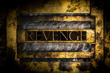 Revenge text on grunge copper and textured lead vintage gold background