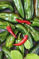 Green and red peppers, on the table for making healthy homemade food, top view, organic natural vegetables 