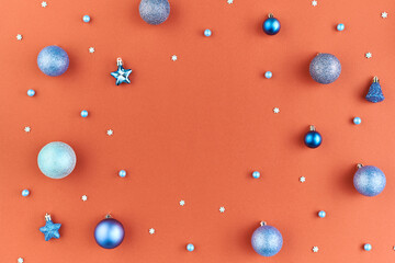 Flat layout of group of decorative snowflakes, blue and silver balls and stars