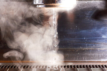 Spilling water from the coffee machine