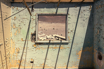 View through window of abandoned house