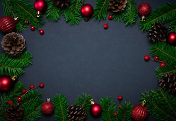 Obraz na płótnie Canvas Christmas Card Template pine branches red ornaments on black background