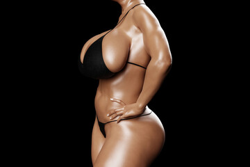 Naklejka premium Sexy young woman with big boobs in a black bikini from the side