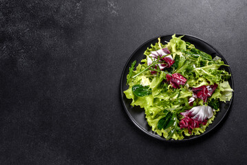 Fresh delicious vegitarian salad of chopped vegetables on a plate