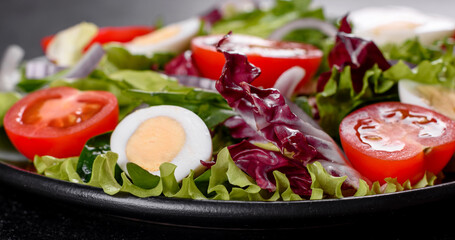 Fresh delicious vegitarian salad of chopped vegetables on a plate