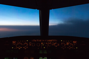 airplane flightdeck Cockpit with sunrise view