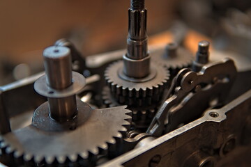 Grey metal gears close up