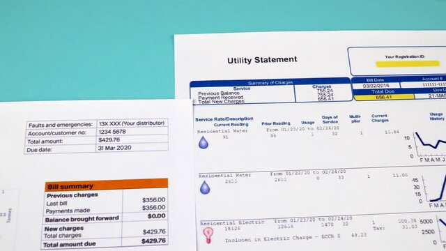 Communal payments. Utility statement, Gas statement and Electricity bill, close-up. Panoramic camera movement