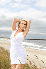 Fototapeta na wymiar woman in dress on beach