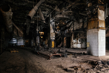 Plakat Burnt and ruined interior of industrial building after fire. Consequences of war, fire or other disaster
