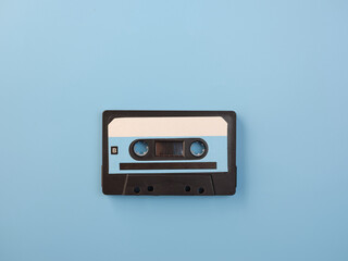Obraz premium Blue audio cassette on blue background