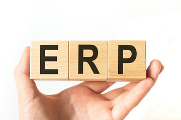 Word ERP made with wood building blocks, stock image. Enterprise resource planning concept