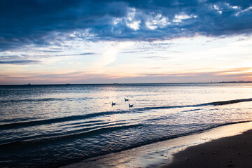 Fototapeta na wymiar beautiful, mystical sunrise over the calm sea