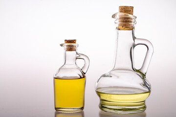 Oil in glass containers. Household oil jugs.