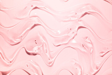 Liquid gel cosmetic smudge red pink texture background 