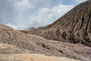 Landscape of Edge volcano at Mount Bromo is an active volcano and part of the Tengger massif, in East Java, Indonesia. The volcano belongs to the Bromo Tengger Semeru National Park.