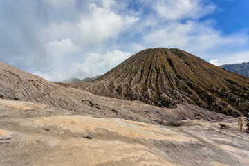 Landscape of Edge volcano at Mount Bromo is an active volcano and part of the Tengger massif, in East Java, Indonesia. The volcano belongs to the Bromo Tengger Semeru National Park.