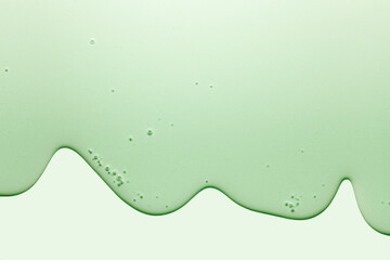 Cream green transparent cosmetic sample texture with bubbles background