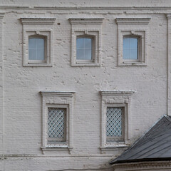 Fototapeta na wymiar Windows in a brick wall