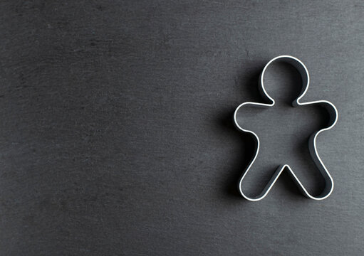 cookie mold in the form of a man on ardesia