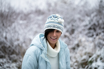 Obraz premium Young woman at winter. Woman snow. Background. 
