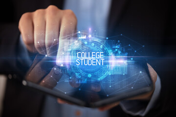 Young man holding a foldable smartphone with COLLEGE STUDENT inscription, educational concept