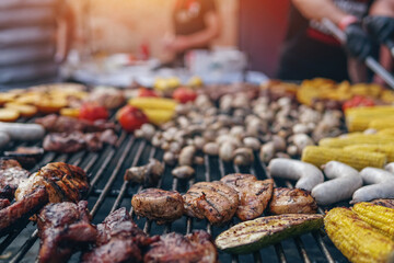 grilled vegetable and meat on barbecue at food fest or festival outdoor