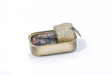 Closeup of an open can of sardines isolated on white background. Canned sardine.