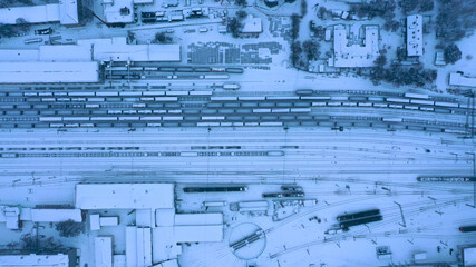 Trains and carriage depot in winter photographed on a drone