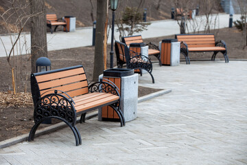 Autumn, 2013 - Vladivostok, Primorsky region - Urban street brown benches close up. Street bench...
