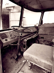Old rusty car in an abandoned factory