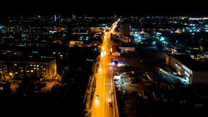 Fototapeta na wymiar Illuminated road in the night