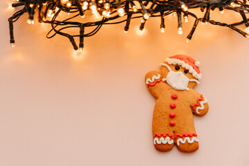 New Year and Christmas celebration in a coronavirus pandemic, conceptual background with ginger man...