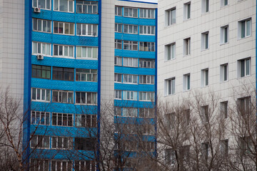 Obraz premium Autumn, 2013 - Vladivostok, Primorsky region - High-rise residential buildings. Multi-colored residential buildings. Windows in residential high-rise buildings.