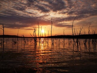 Fototapeta na wymiar sunset on lake tambukan caucasus