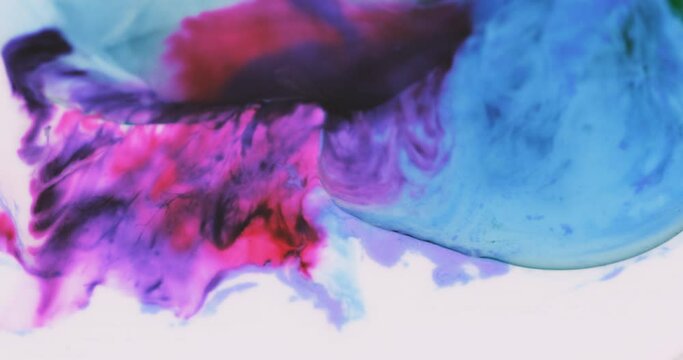 Macro Paint with Vibrant Color Palette. Oil Mixed with Blue and Red Dye, Ink, and Paint.