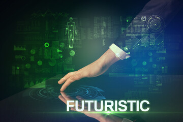 Fototapeta na wymiar Businessman touching huge display with FUTURISTIC inscription, modern technology concept