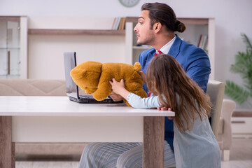Girl bothering young father during working from house in pandemi