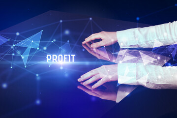 Businessman touching huge screen with PROFIT inscription, modern technology business concept